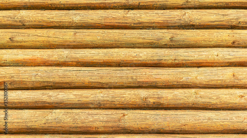 wooden logs stacked on top of each other, background texture