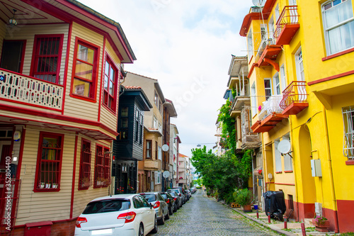 Fototapeta Naklejka Na Ścianę i Meble -  Historical, Old, Colorful Houses in Kuzguncuk, classic Ottoman wooden architecture in Kuzguncuk ,Istanbul, Turkey.