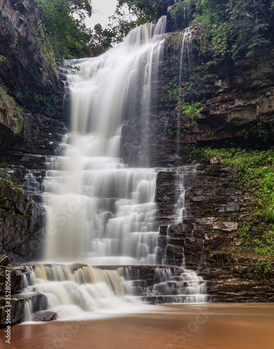 Slower Shutter speed to enhance milky water Kloof waterfall gorge South Africa