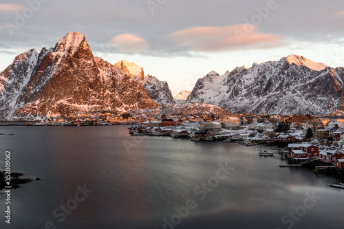 Sunset over the Fisher Village Reine at the Lofoten Islands in Norway © Luca
