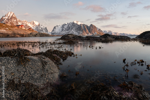 Sunset at the Beach of the Village Reine at the Lofoten Islands in Norway