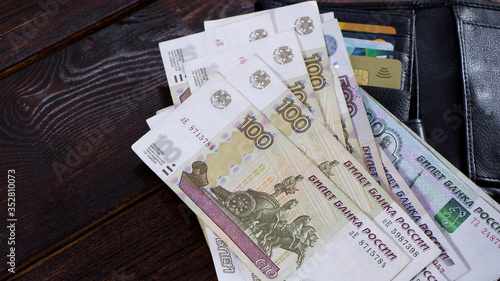 Photos Lot with Russian rubles is on the wallet with credit cards