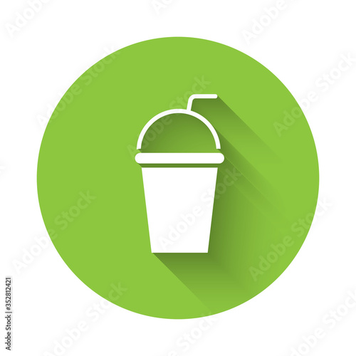White Paper glass with drinking straw and water icon isolated with long shadow. Soda drink glass. Fresh cold beverage symbol. Green circle button. Vector Illustration