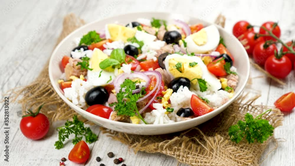 rice salad with egg, tomato, onion and tuna fish rice salad with egg, tomato, onion and tuna fish