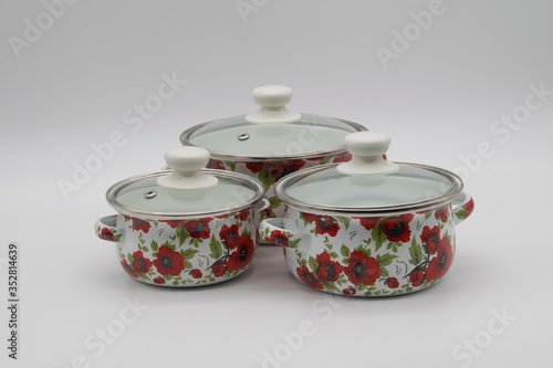 enameled pans on a white background