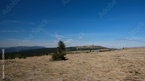 View of Petrovy Kameny and Praded transmitter tower in Jeseniky mountain ridge. Czech Republic photo