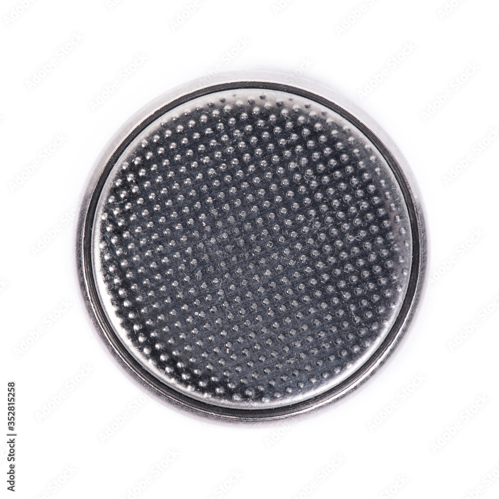 Flat lithium round button cell battery isolated Flat lithium round button cell battery isolated