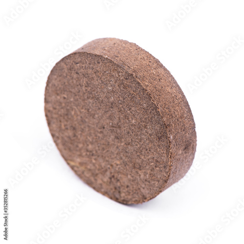 Dry peat pellets, compressed compost tablet