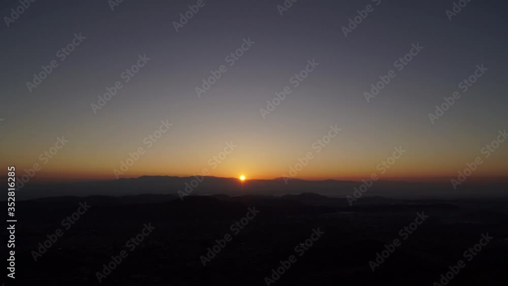 suburb sunrise with silhouettes of forest (time-lapse) suburb sunrise with silhouettes of forest (time-lapse)