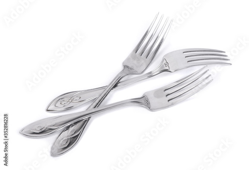 Quadro em tela Three stainless steel forks