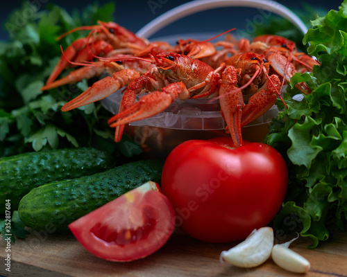 boiled crayfish with vegetables and herbs