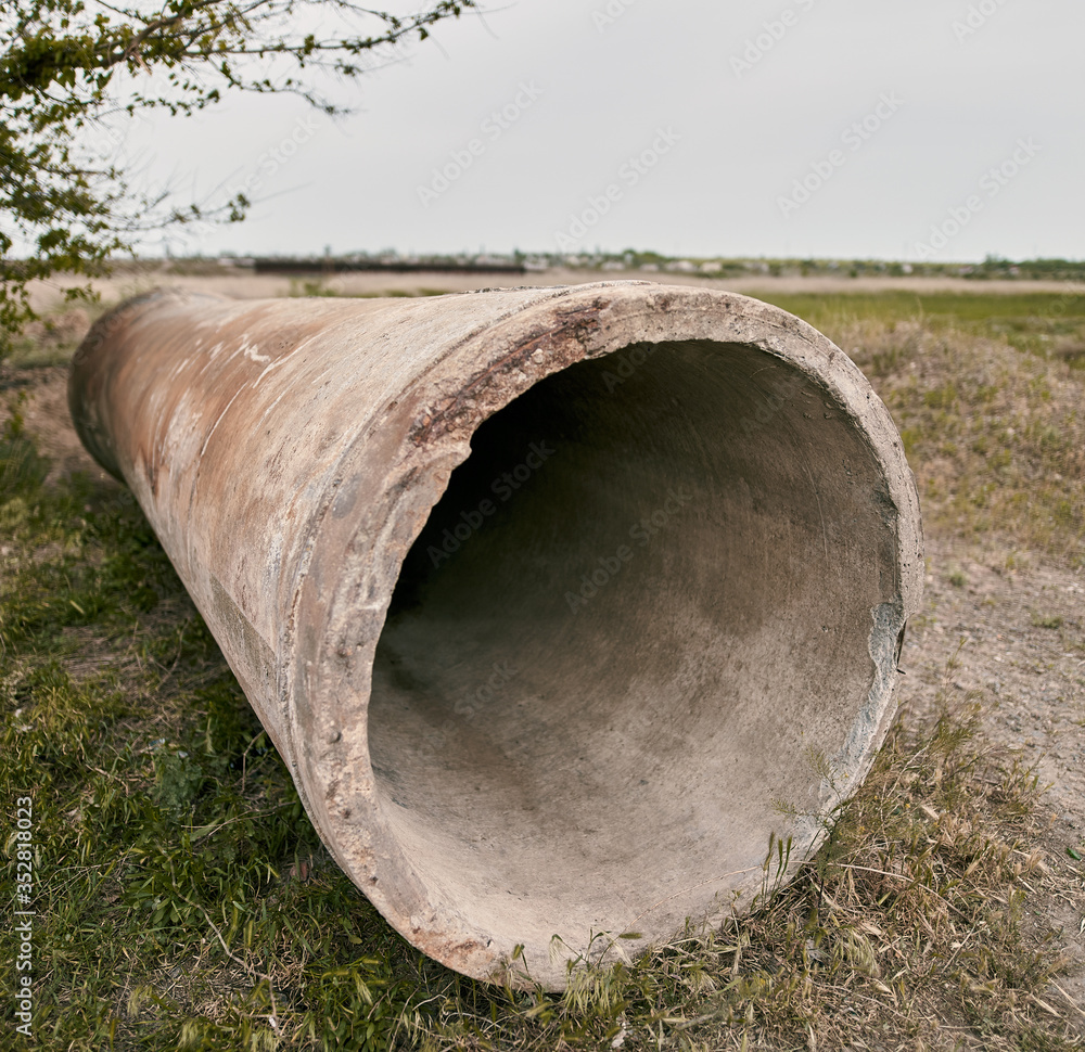 old and abandoned concrete manhole pipe old and abandoned concrete manhole pipe