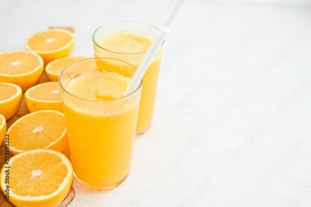 Orange juice in glass, fresh fruits on wooden background Orange juice in glass, fresh fruits on wooden background