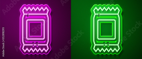 Glowing neon line Fertilizer bag icon isolated on purple and green background. Vector Illustration