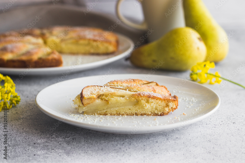 Delicious pear and almond pie. Romantic summer composition with flowers Delicious pear and almond pie. Romantic summer composition with flowers