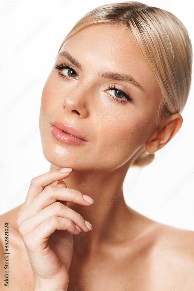 Image of beautiful shirtless woman posing and looking at camera