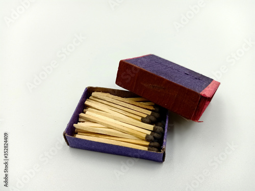 Half opened blank matchbox with matches inside isolated on white