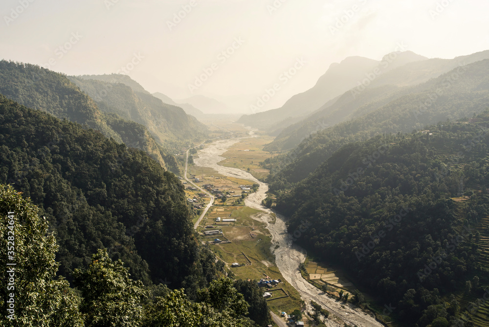 Fototapeta premium Pedhi valley, entrance of Annapurna Conservation Area, from the heights, Nepal, Himalayas