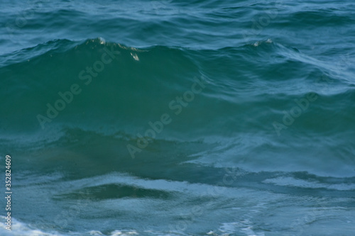  Blue sea That is a wave, because the strong wind causes the beautiful water to rise