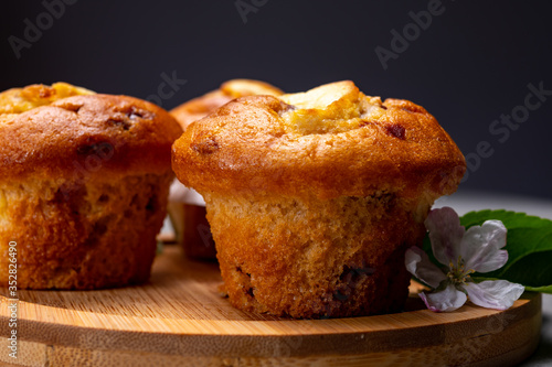 Fresh baked muffins with apple and cinnamon close up