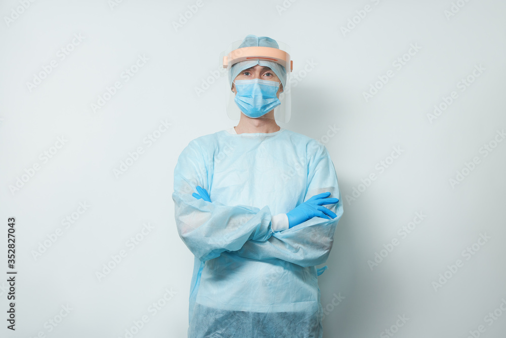 Doctor wearing surgical face mask and gloves. Doctor wearing surgical face mask and gloves.