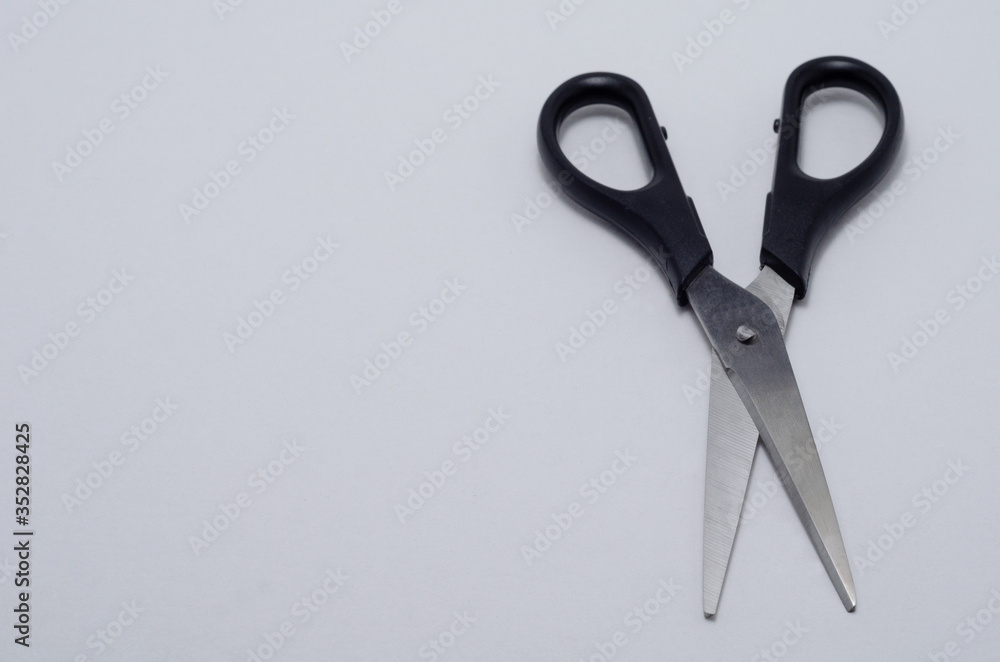 scissors on a white background. on right. close-up scissors on a white background. on right. close-up