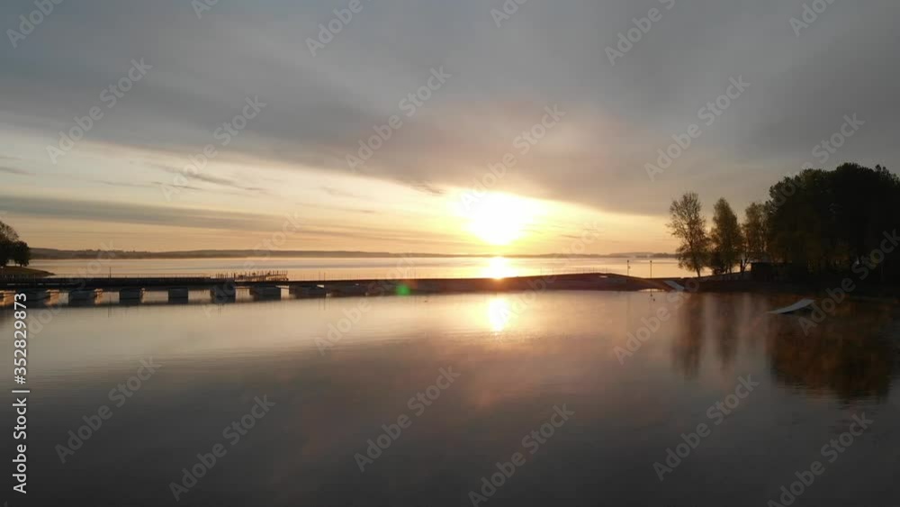 Sunrise on the lake. Drone shooting. Sunrise on the lake. Drone shooting.