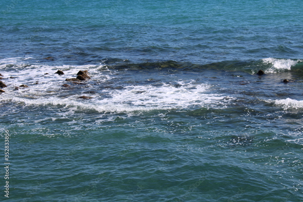 Obraz premium view of waves in blue sea water 