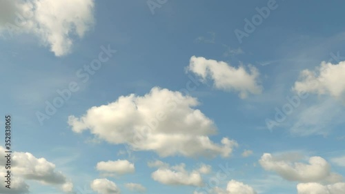 3D animation of a graduation hats in the air on the blue sky background. University completion and diploma awarded ceremony. It's an old tradition to throw academic caps high in the air, loopable.