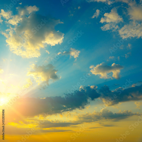 Epic sky landscape with bright sun and dark fantastically clouds