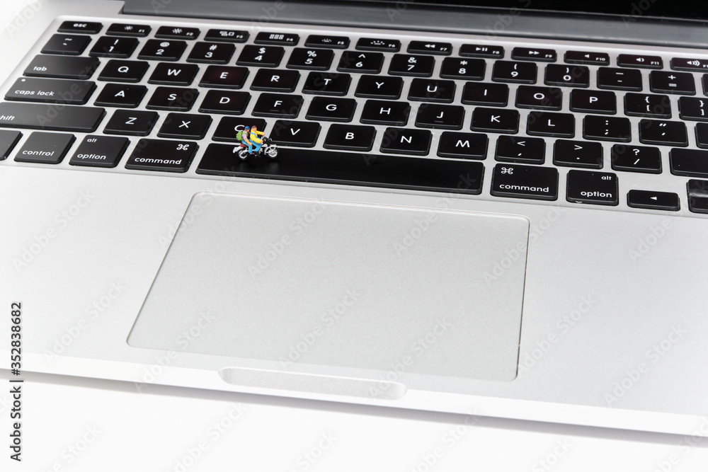 Two motorcyclists ride along the space bar of a laptop - Tiny People Adventure Series Two motorcyclists ride along the space bar of a laptop - Tiny People Adventure Series