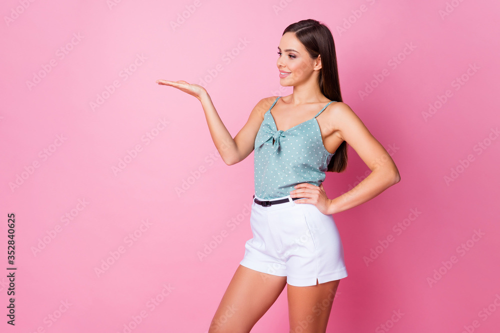 Portrait of her she nice-looking attractive lovely gorgeous winsome pretty cute cheerful girl posing holding on palm copy space ad advert isolated over pink pastel color background Portrait of her she nice-looking attractive lovely gorgeous winsome pretty cute cheerful girl posing holding on palm copy space ad advert isolated over pink pastel color background