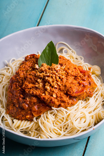 crab fat pasta with fried garlic also known as aligue pasta in the Philippines photo