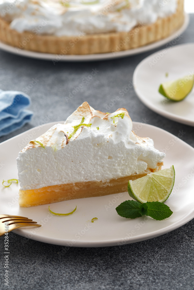 Homemade baked lemon tart cake with meringue cream. Copy space. Homemade baked lemon tart cake with meringue cream. Copy space.