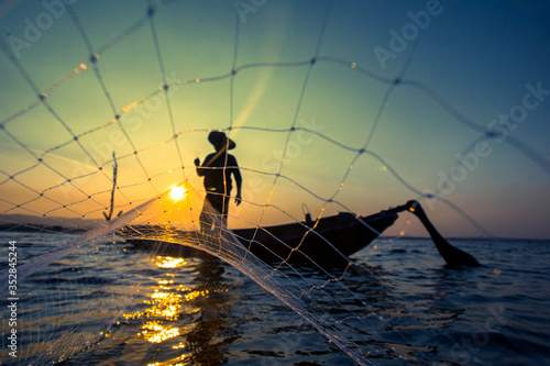 Fisherman net sunset Silhouette boat