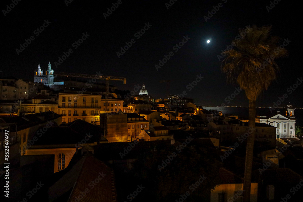 Night view of Lisbon. The photo of the city and the old Church