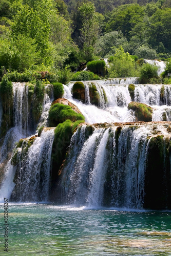 Beautiful waterfalls in National Park Krka  Croatia on a sunny summer day. 