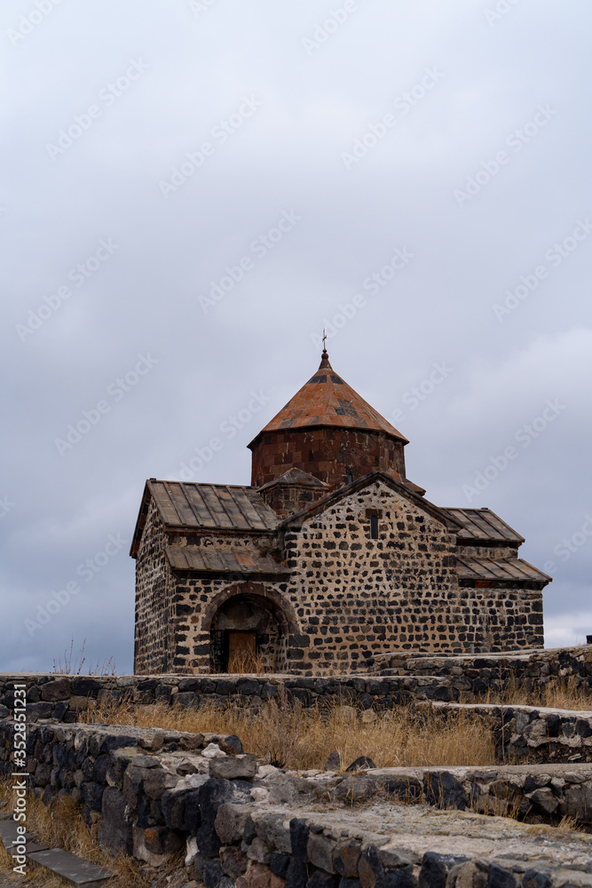 Armenia, autumn, 2019: Sevanavank monastery on cloudy autumn day