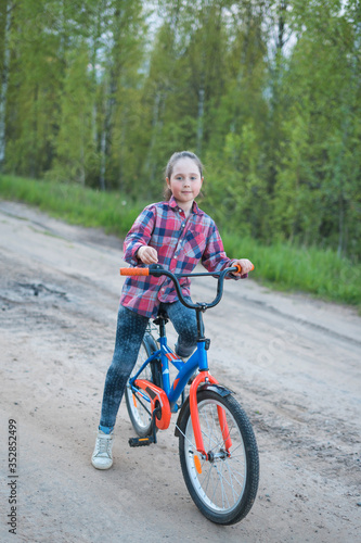 little girl on a Bicycle