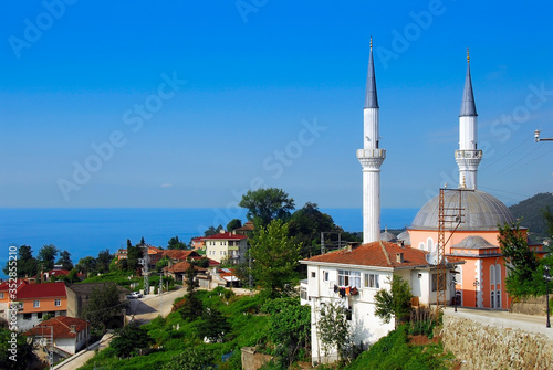 TRABZON, TURKEY - JUNE 28, 2008: Yeniay Village, Mosque and Black Sea. Surmene District