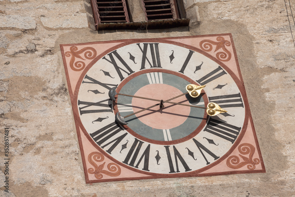 The clock painted and recently restored outside the bell tower of the church. The clock painted and recently restored outside the bell tower of the church.