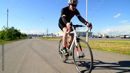 Man on bike cycling road bike, Pedaling Road Bicycle, sport concept photo