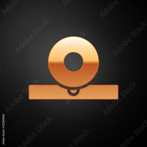 Gold Otolaryngological head reflector icon isolated on black background. Equipment for inspection the patient's ear, throat and nose. Vector Illustration