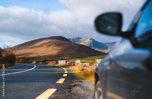 turn of road and car photo