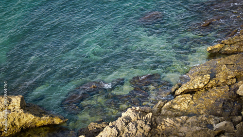 A close up of clear sea by the shore