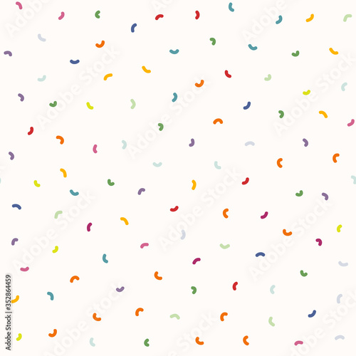 
Sparse confetti dotty paper texture seamless background. Tiny colored flecked swirl comma sprinkles isolated. Modern cute falling speckle pattern. Japanese kawaii minimal summer party scrapbook paper