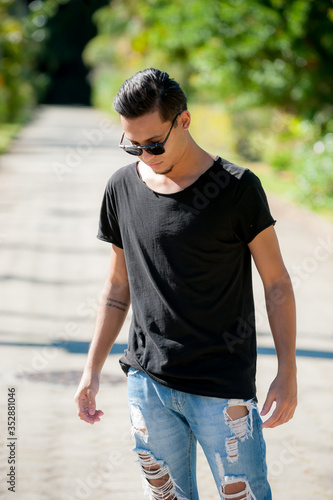 portrait of a young man with sunglasses