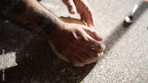 hands man, during lockdown, making pizza italian style recipe, at home