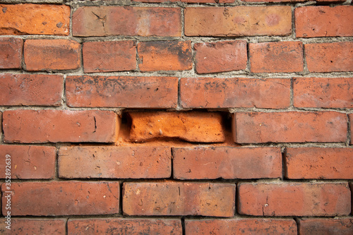 Eroded brick in a masonry wall