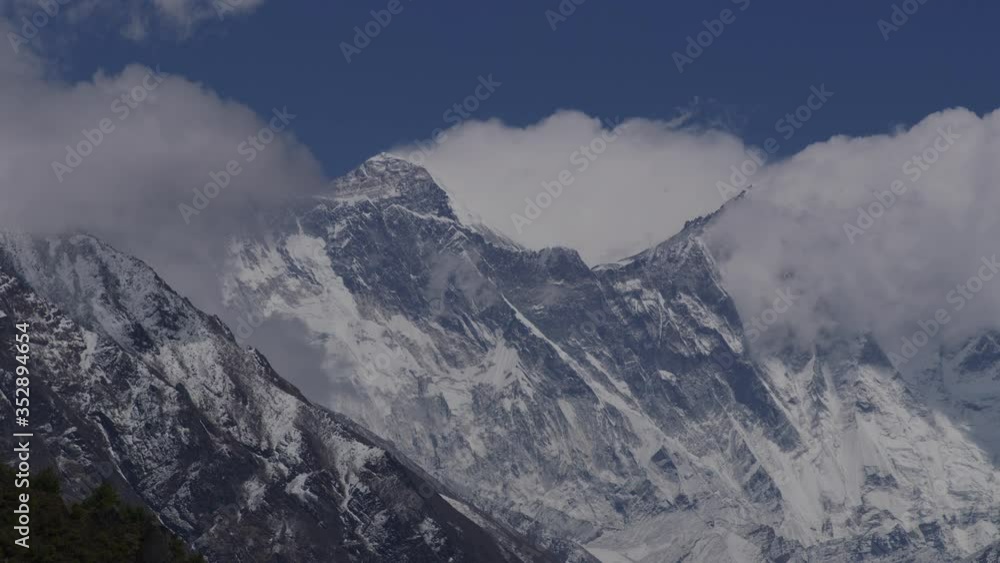 Himalayas with Everest in backdrop with clouds moving across the background, shot on RED Helium 8K 16Bit RAW, ProRES RED Gamma 2.2